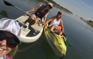 JVA grantwriters Kat, Erin and Lisa kayaking
